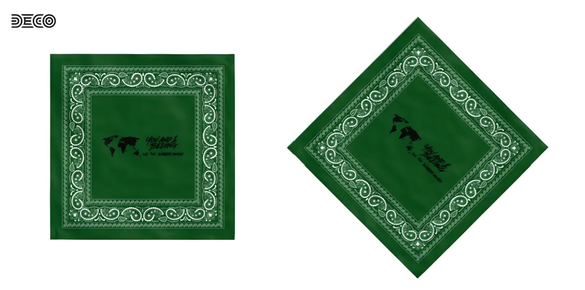 Flat and angled product views of a green bandana featuring a white paisley border and a black You and I Belong world map logo in the center.