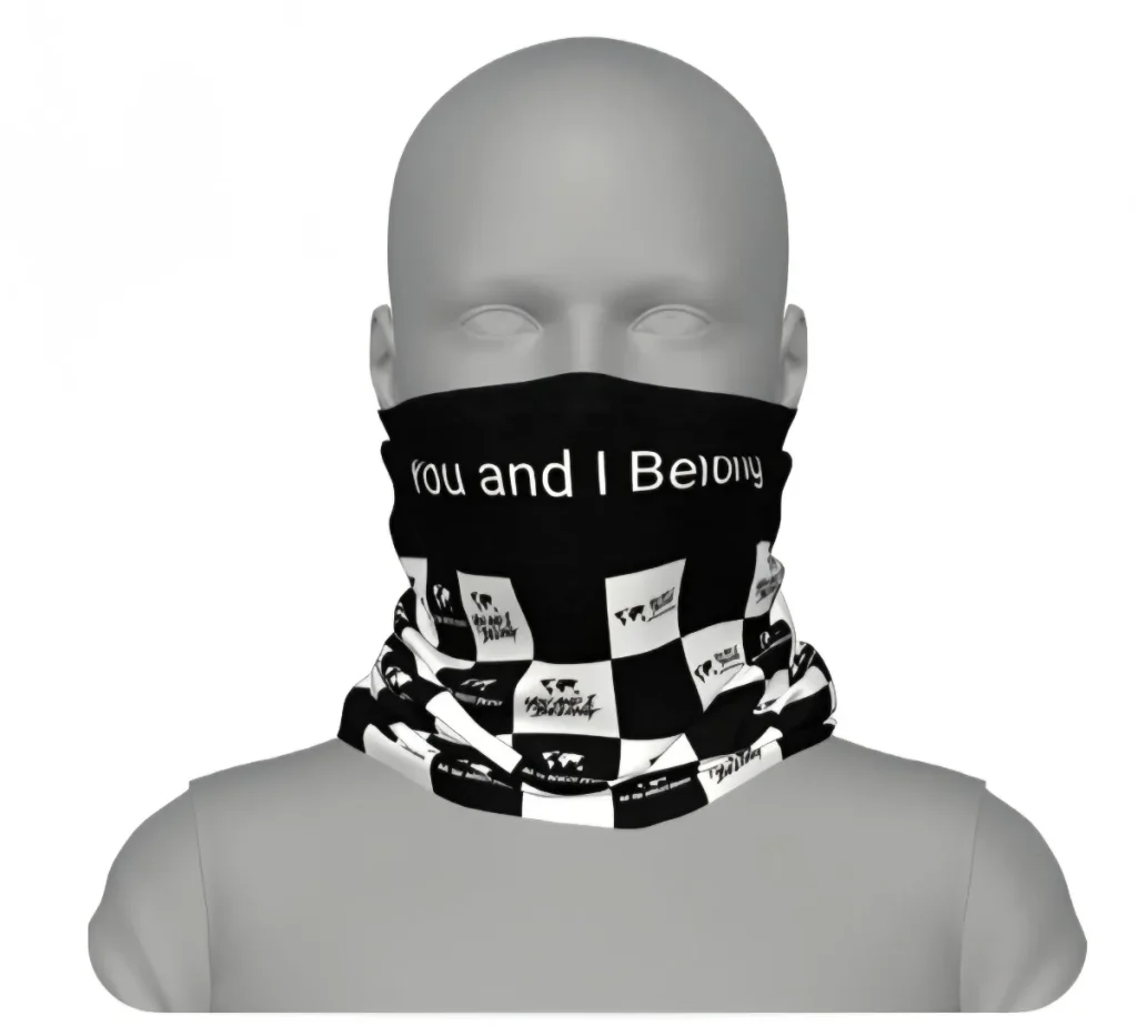 Here are the alt texts for your images: neck-gaiter-manequin.jpg: A grey mannequin head wearing a black and white neck gaiter. The top half is solid black with the text "You and I Belong" in white, while the bottom half features a black and white checkerboard pattern containing small world map silhouettes.